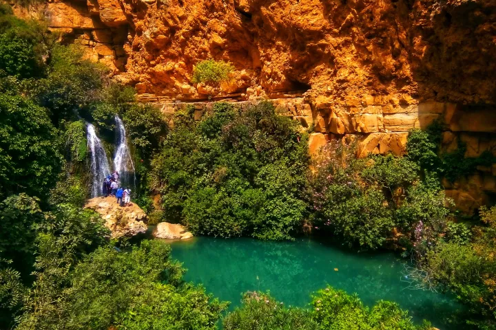 Algeria Waterfall Small Lake Red Cliffs in Algeria
